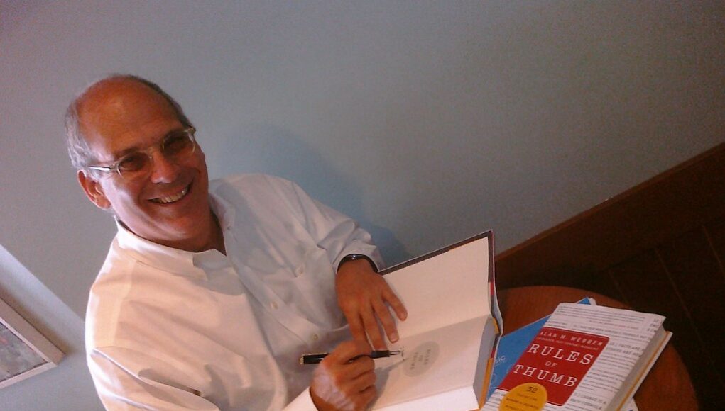 Alan Webber signs my copy of his book